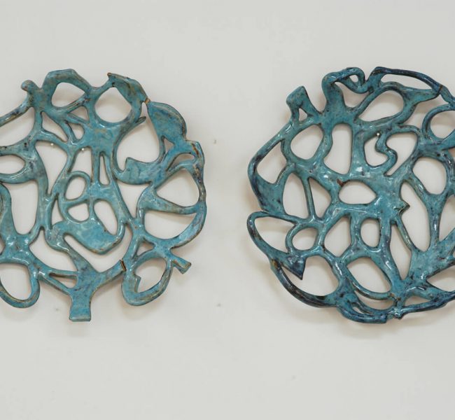 unravelling ceramic wall pieces